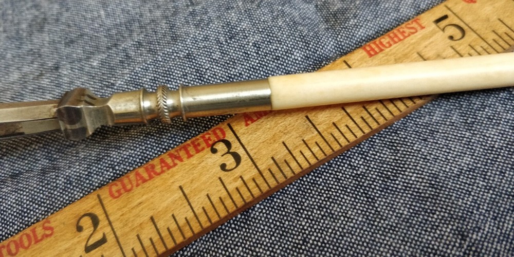 Vintage drafting Pen with white handle Bone?