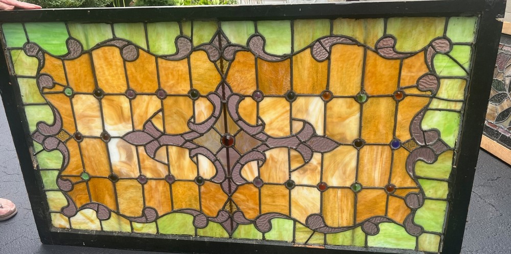 Antique stained glass landing window