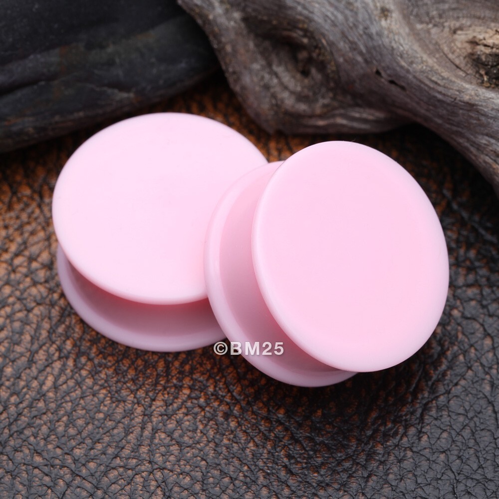 A Pair Of Soft Pastel Silicone Double Flared Plug