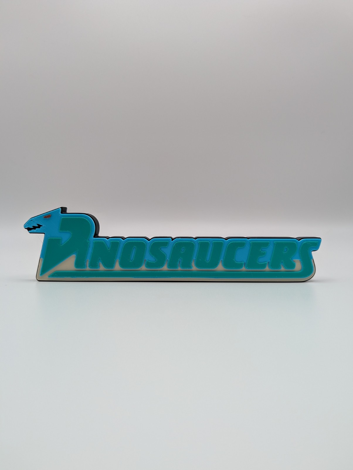 Dinosaucers Logo Display Sign For Collections