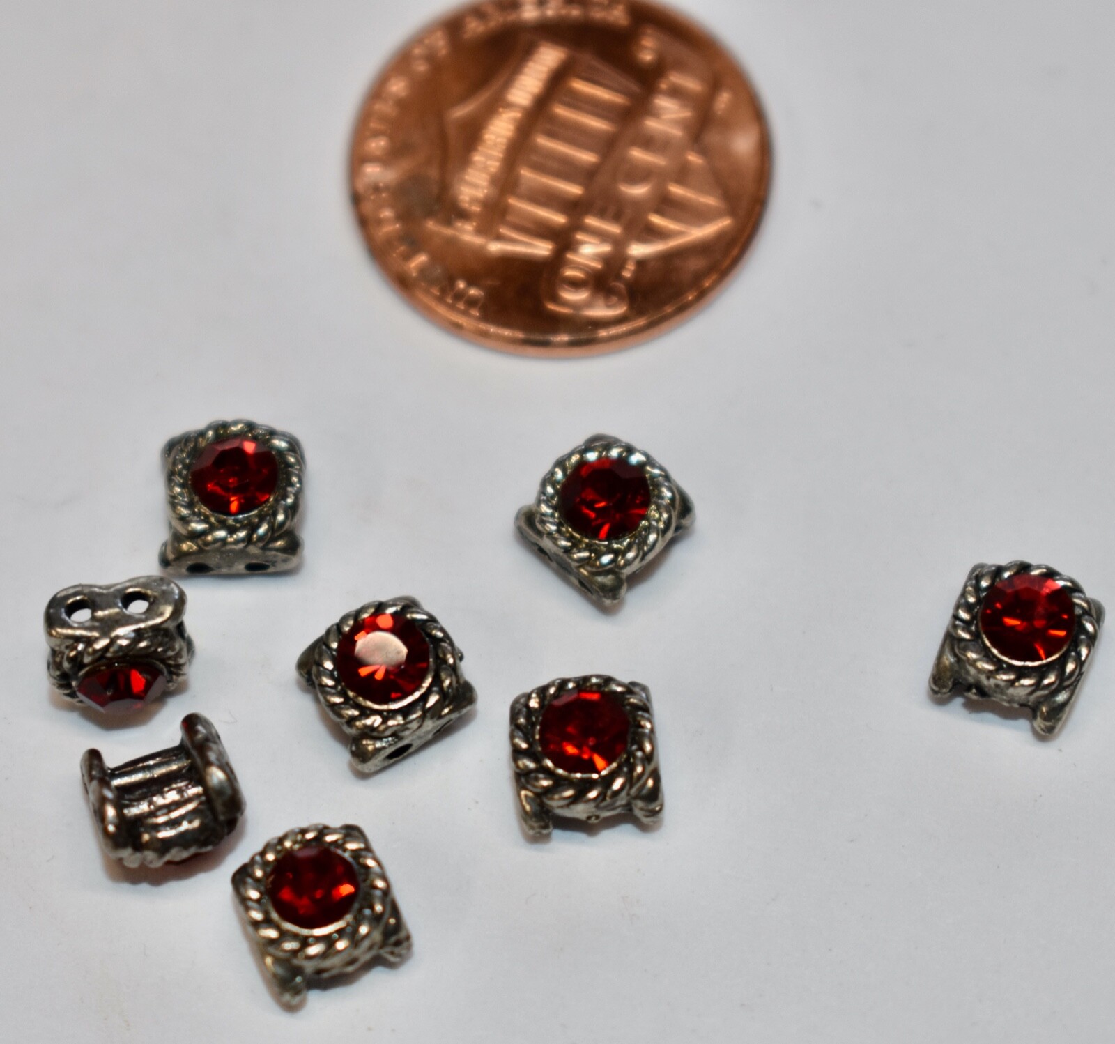 RED RHINESTONE SEW ON BEAD SILVERTONE SETTINGS 6mm