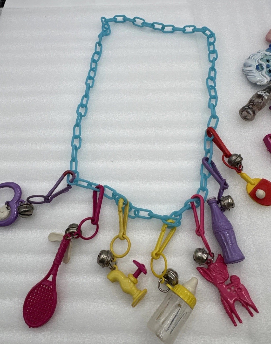 Vintage 1980's Plastic Bell Charm Clip Necklace w 2 Chains and 34 Charms.