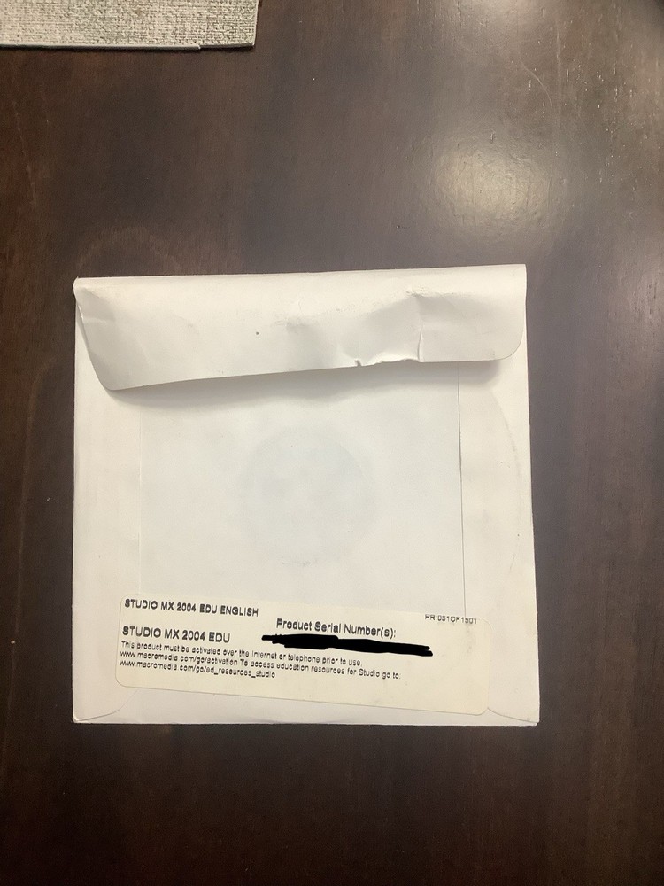 Macromedia Studio MX 2004 - Windows/MAC CD - With Serial Number ZWSD702CD