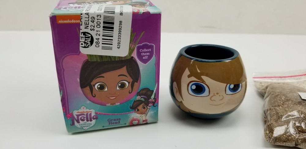 Nella Garret Grass Head