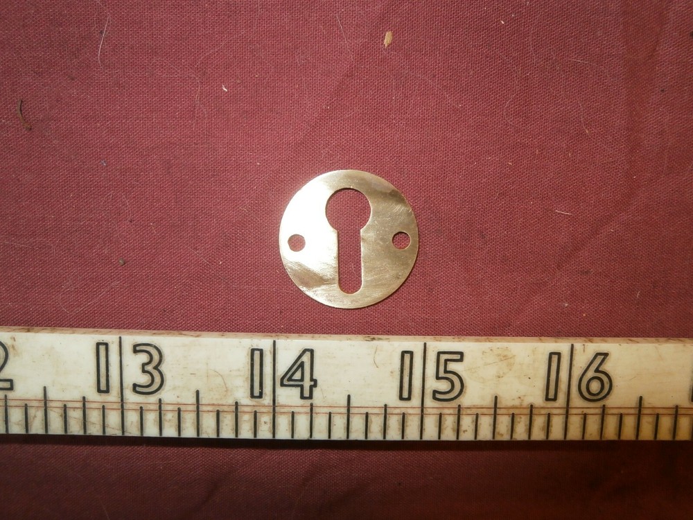 Vintage brass keyhole cover