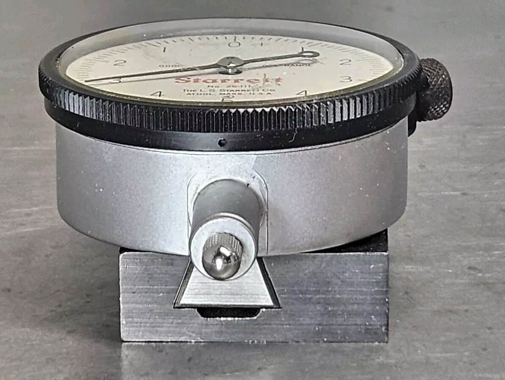 Starrett No. 25-111 dial indicator with No. 674-2 adjustable mounting bracket