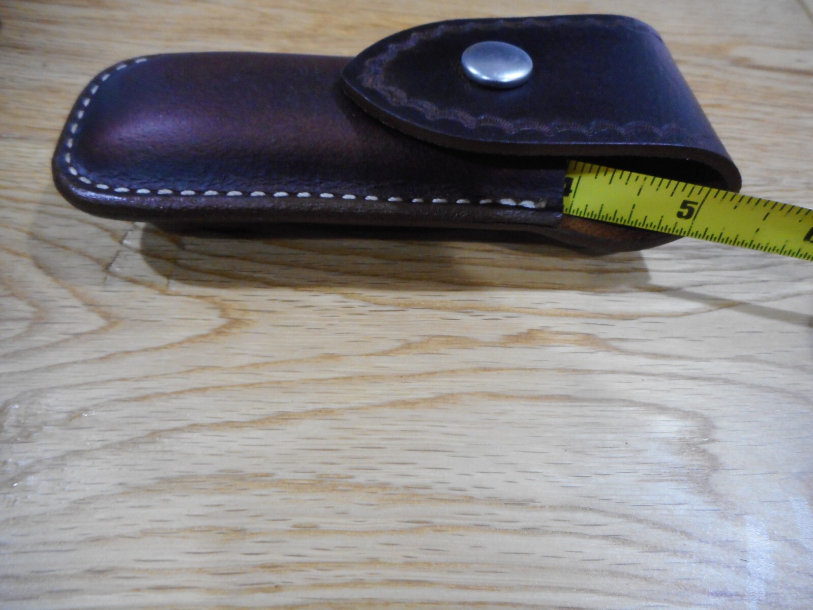 Buck 110 custom leather knife sheath. Brown. Tooled flap. Sheath only