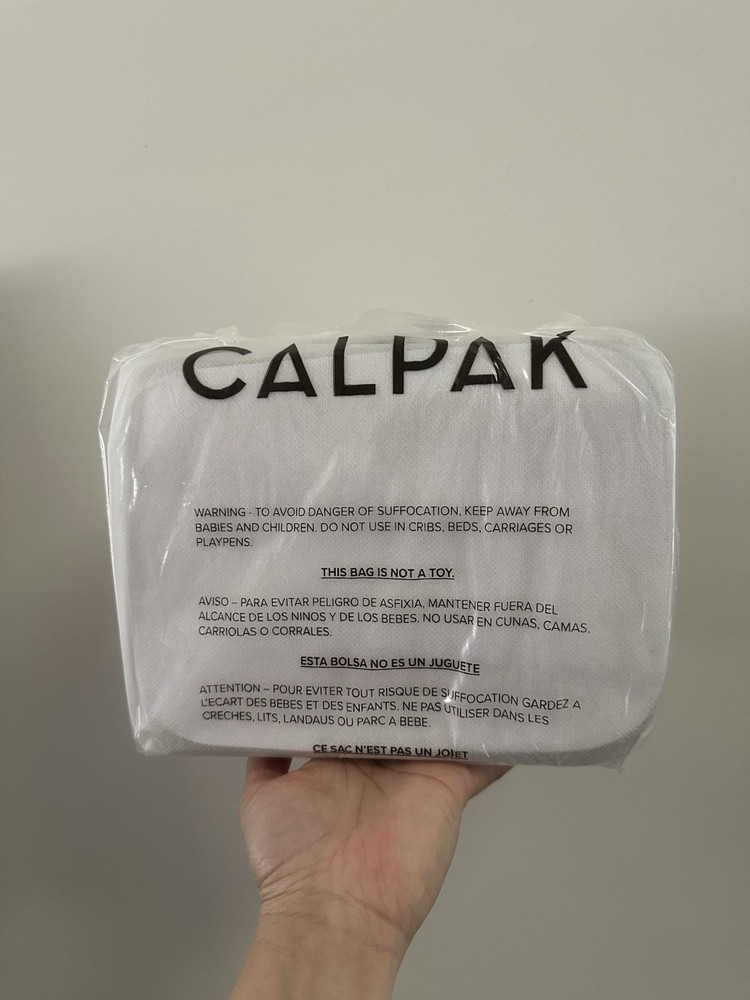 NWT CALPAK Small Clear Cosmetics Case in Stone