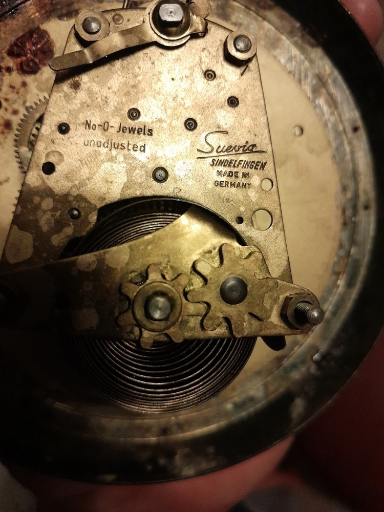 A German Brass-Mounted Clock and Barometer