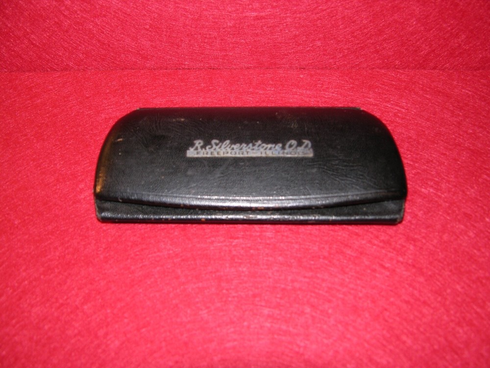 Antique welding glasses with case