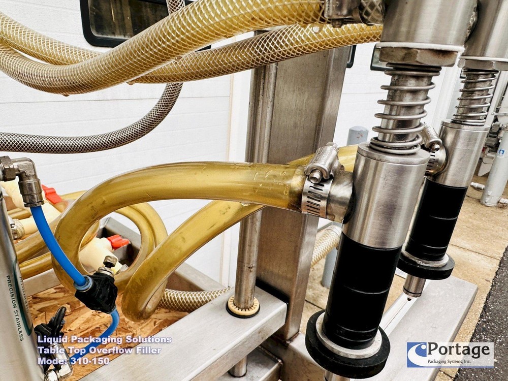 Liquid Packaging Solutions Model: 310-150 || Semi-Automatic Table Top Overflow