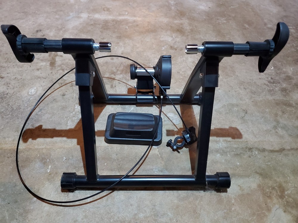 Indoor exercise bicycle trainer stand, black. Never used.