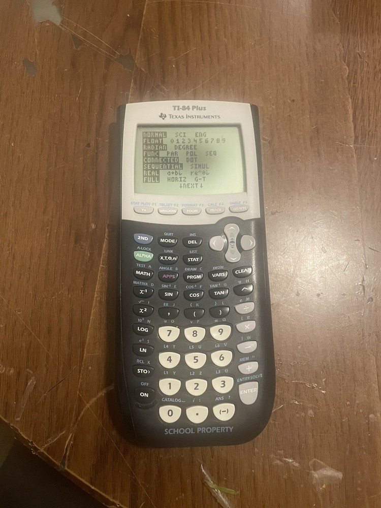 Texas Instruments TI-84 Plus Graphing Yellow and Black Calculator Read De