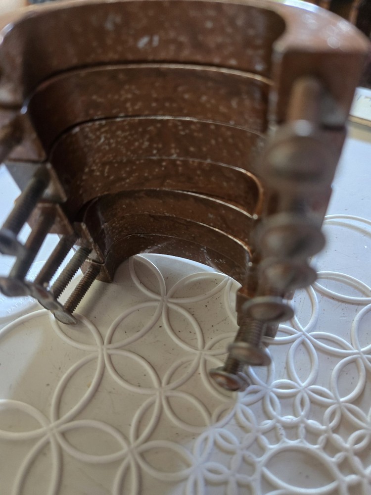 Antique copper metal door pulls with hammered texture finish.