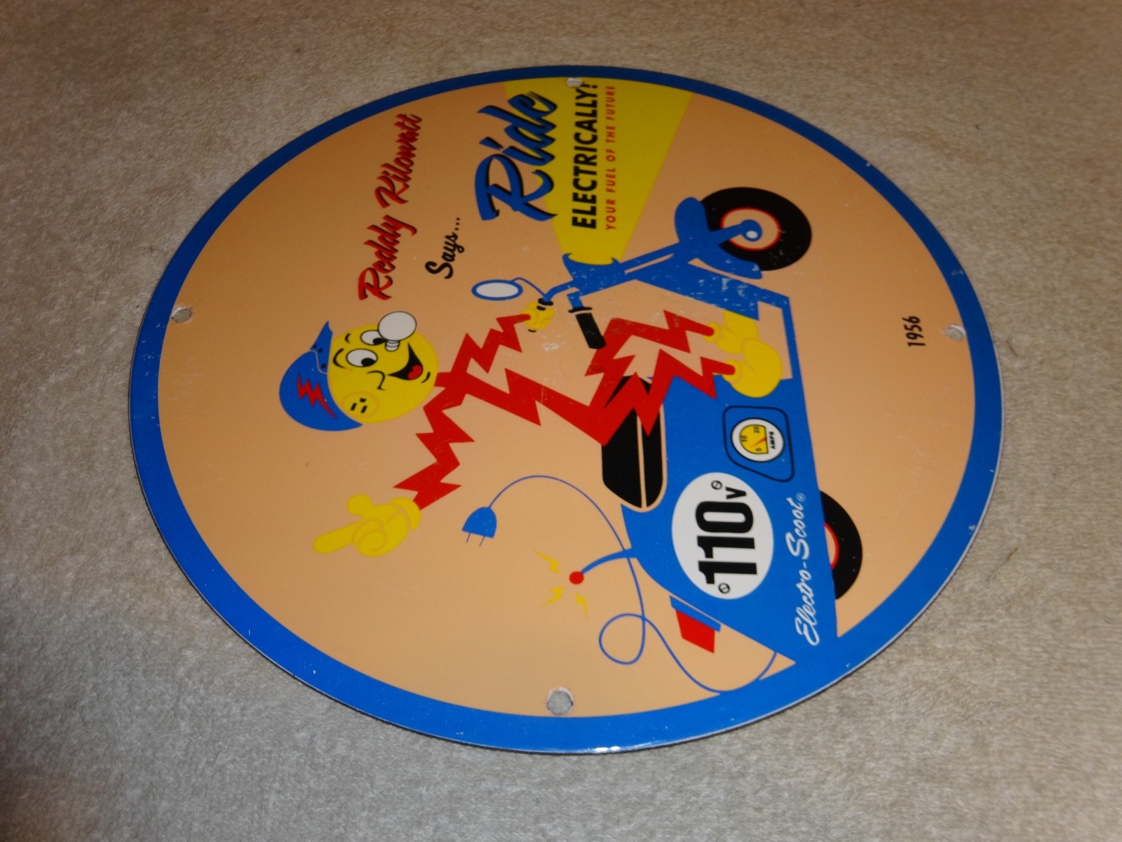 VINTAGE 56 REDDY KILOWATT ELECTRIC SCOOTER 11 3/4" PORCELAIN METAL GASOLINE SIGN