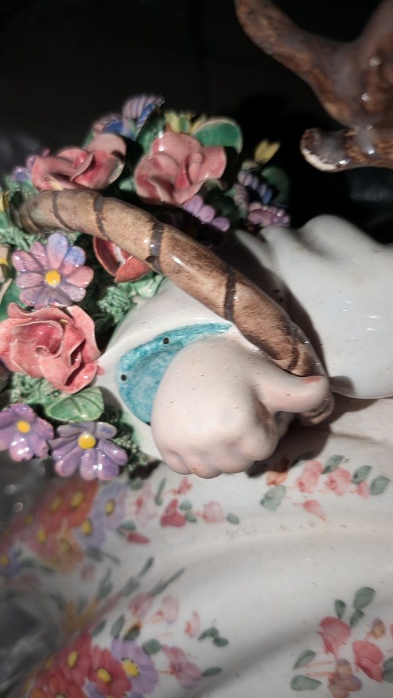 Old, vintage, and potentially haunted doll.