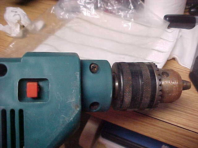 1/2 inch impact drill w/ level. reversible. 2 speed