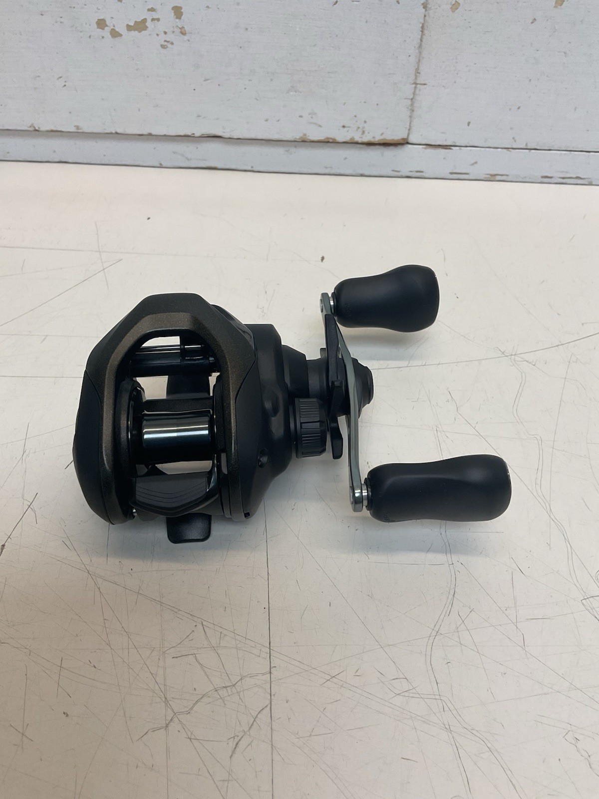 SHIMANO "CAIUS-150-HG-C" BAITCASTER--7.2.1. GR--R-HAND (NO-BOX)