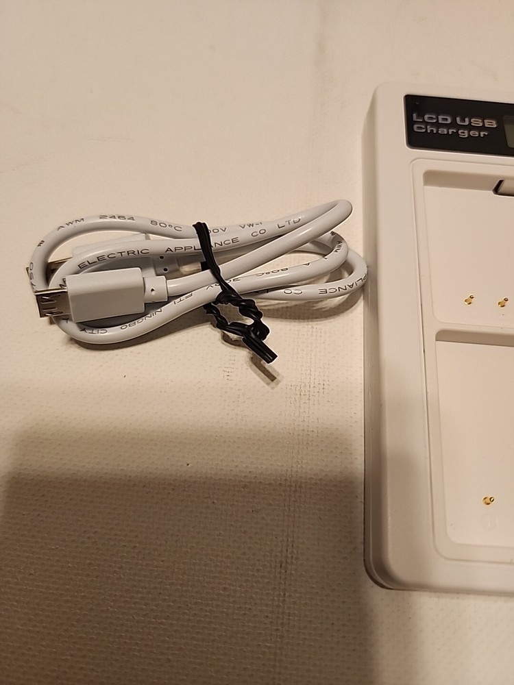 2-Pack Battery and Charger video/ Digital Camera.