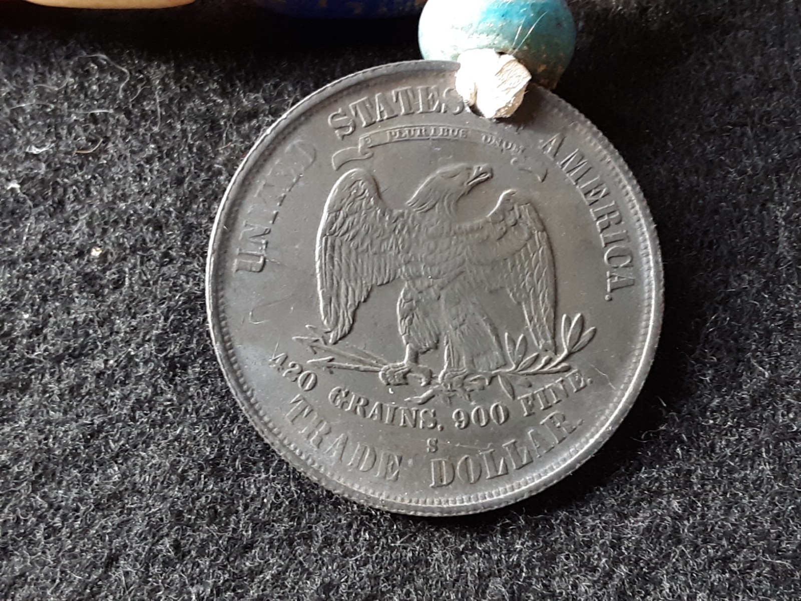 1878 TRADE DOLLAR COPY, ON LEATHER STRUNG TRADE NECKLACE, WHA-0226*09102