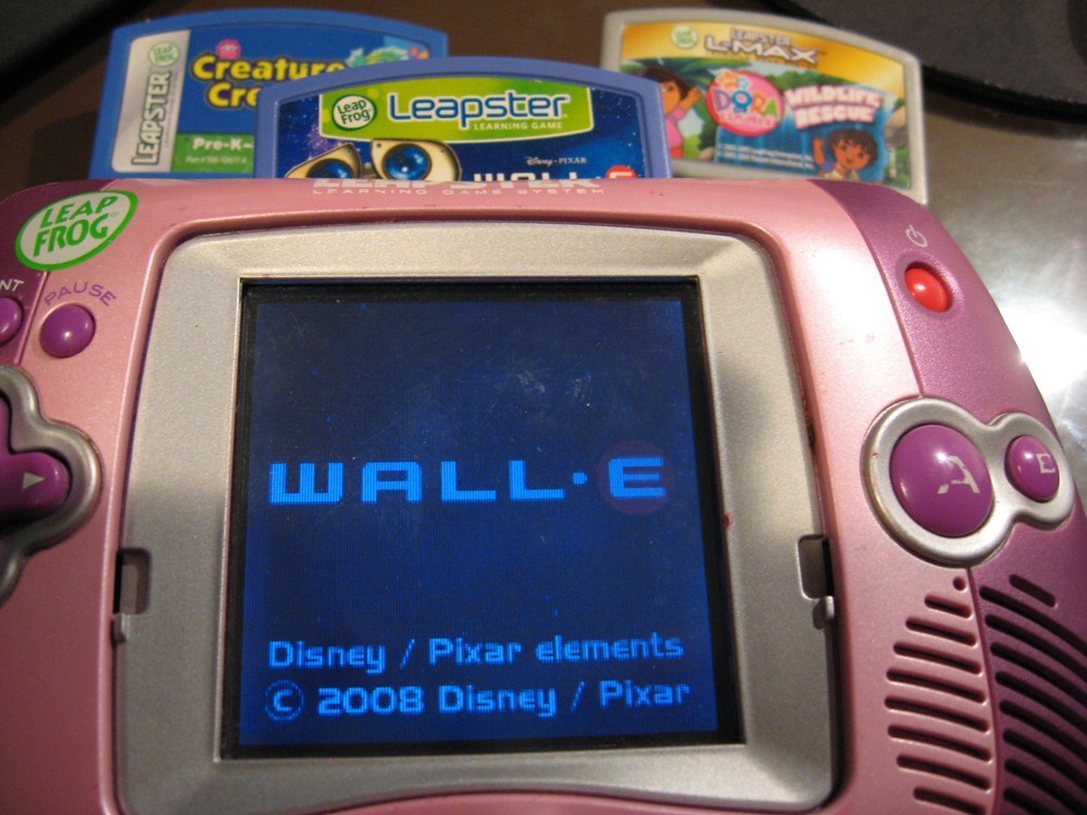 LeapFrog Leapster Learning Game System + 3 Dora Creature Pixar Wall Games WORKS