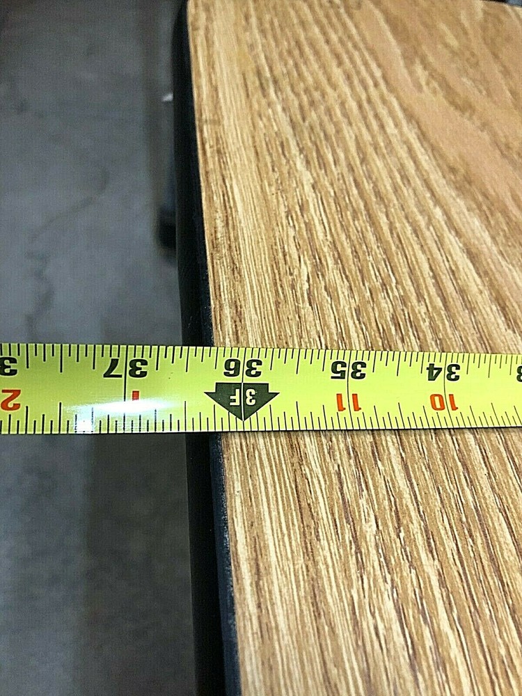 Huasmann electronic elevating table 4375 work surface adjustable 27” to 43” high