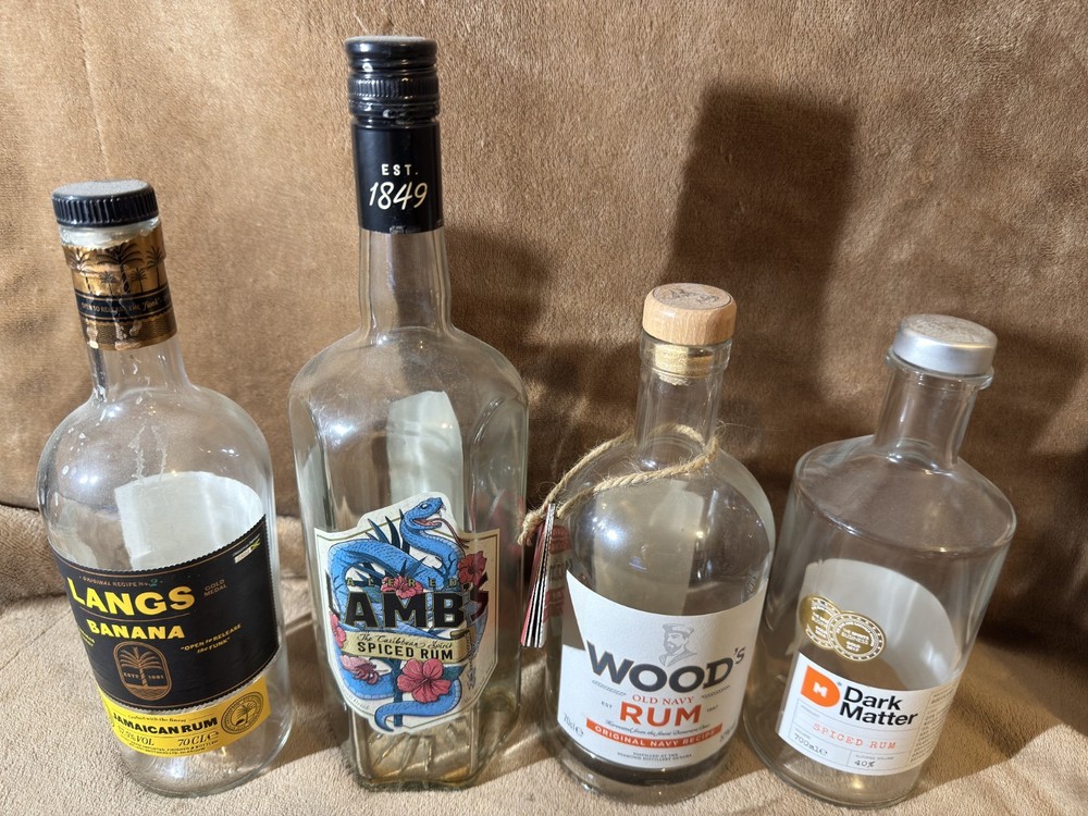 4 EMPTY RUM BOTTLES MIXTURE