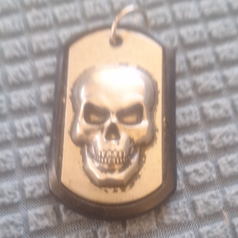 Military Dog Tag Original with Rubber Silencer 'DRIVEN' Inscription