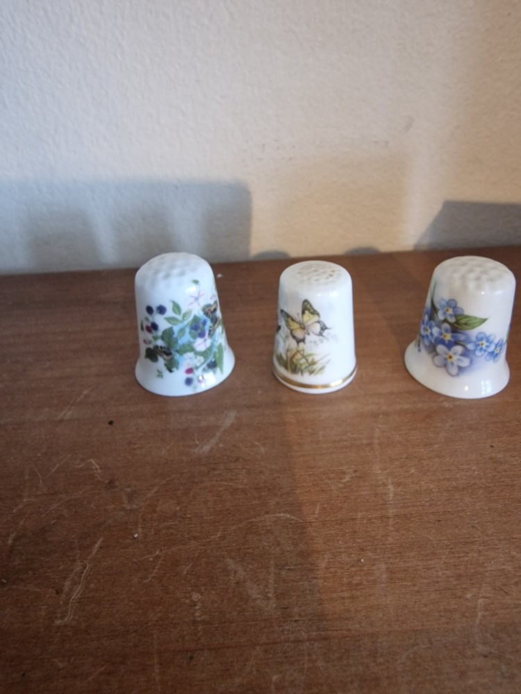 4 Floral themed thimbles