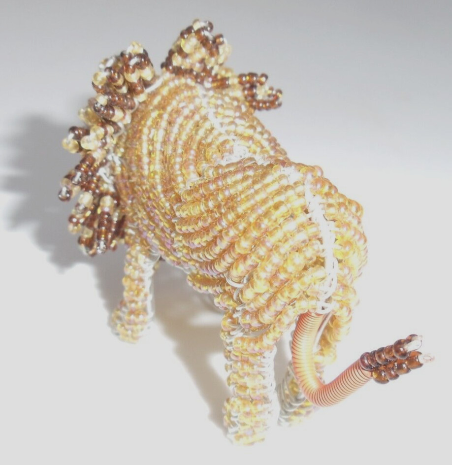 Beaded land: Miniature lion