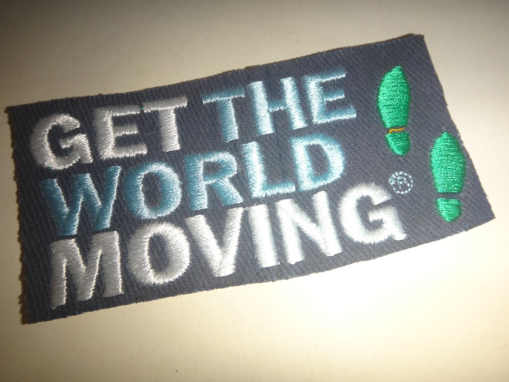 Slogan GET THE WORLD MOVING Machine Embroidered Patch