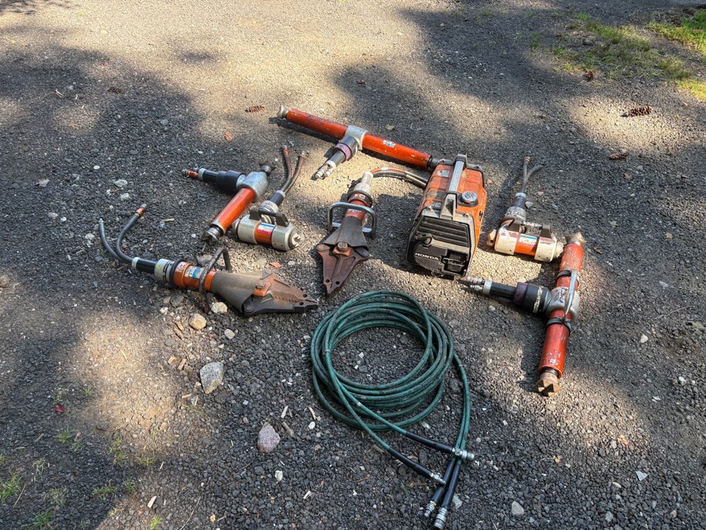 Holmatro rescue tools. Includes gas pump and assorted tools