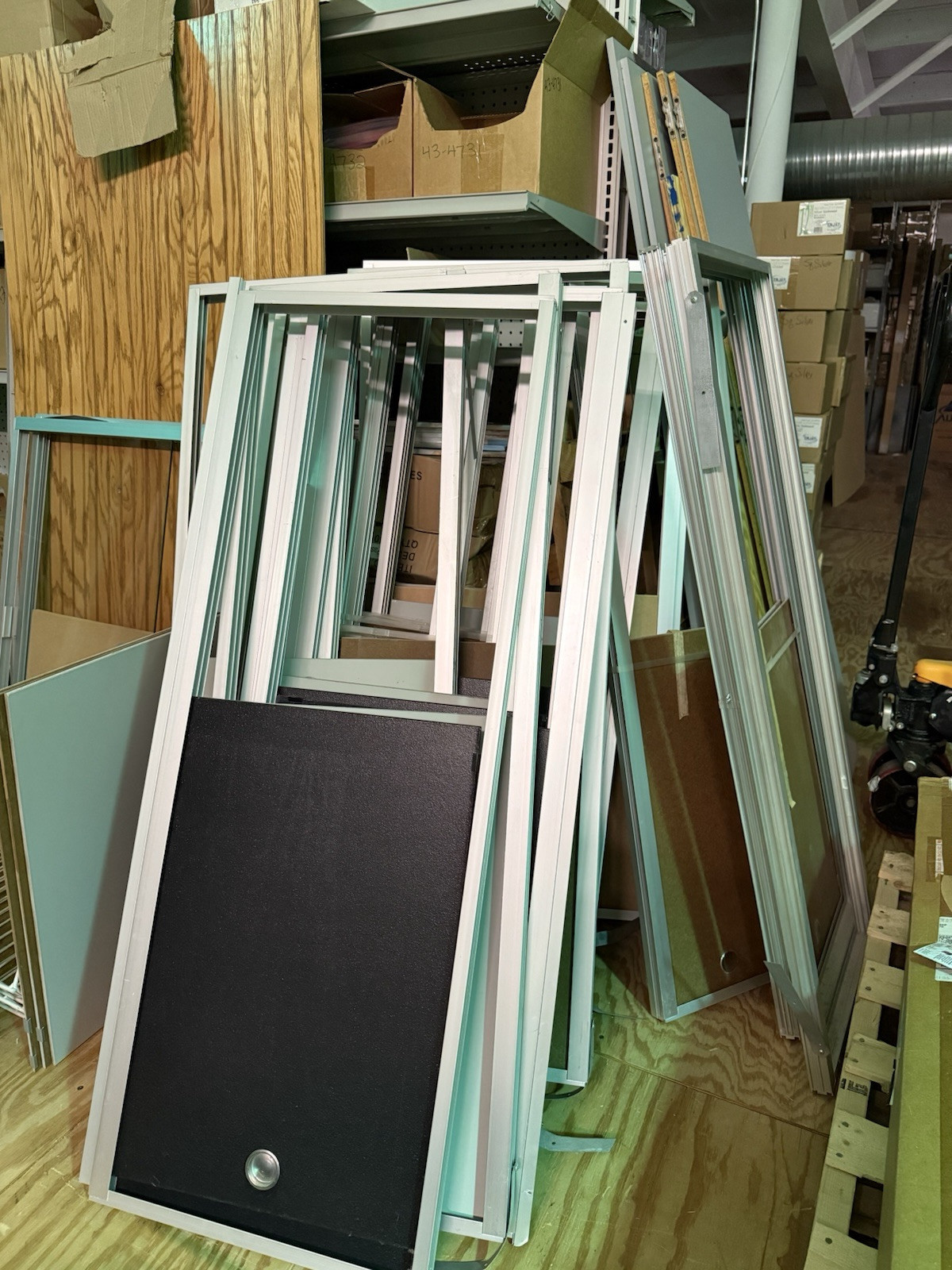 HUGE lot of pallets of Used Lozier Shelving shelves, components, glass cases