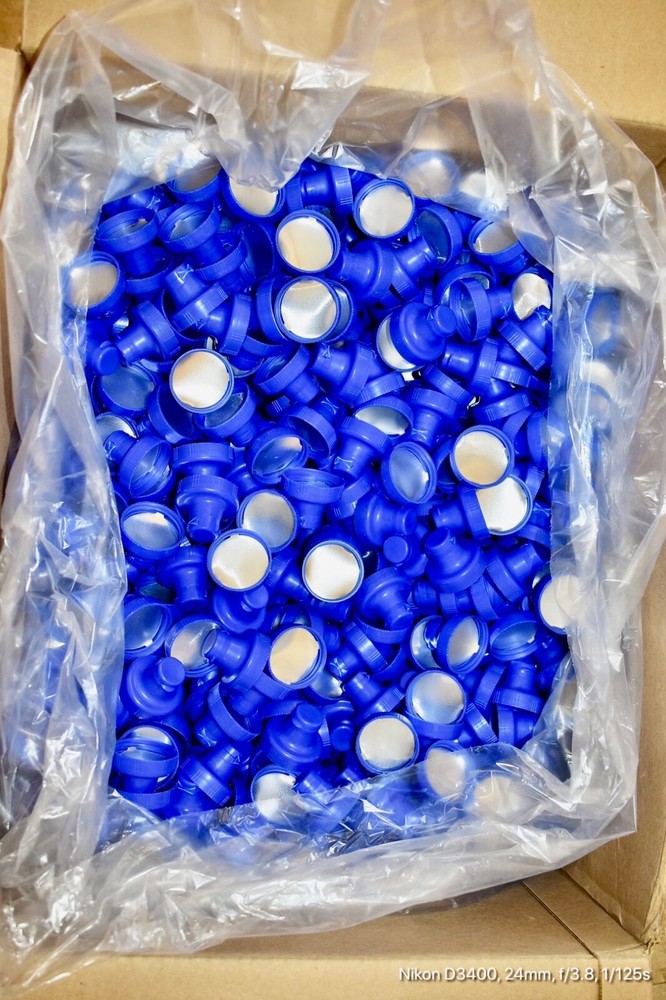 Aptar-38-400 Blue Flip Top Tab Caps with valve. Quantity 1200