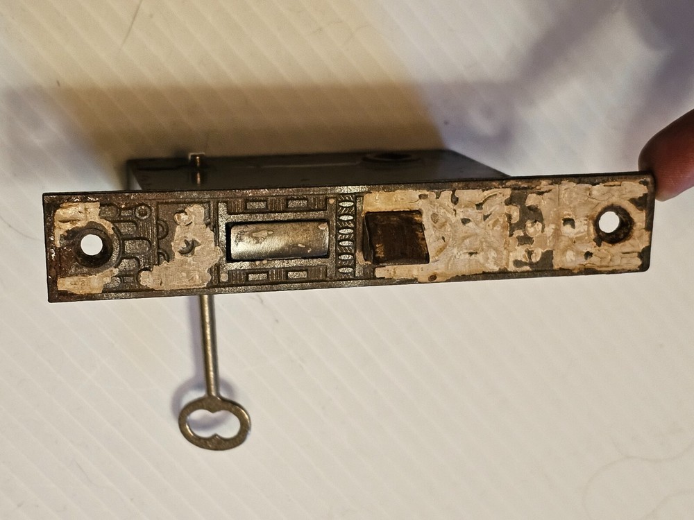 A OLD DOOR LOCK and KEY it WORKS. E