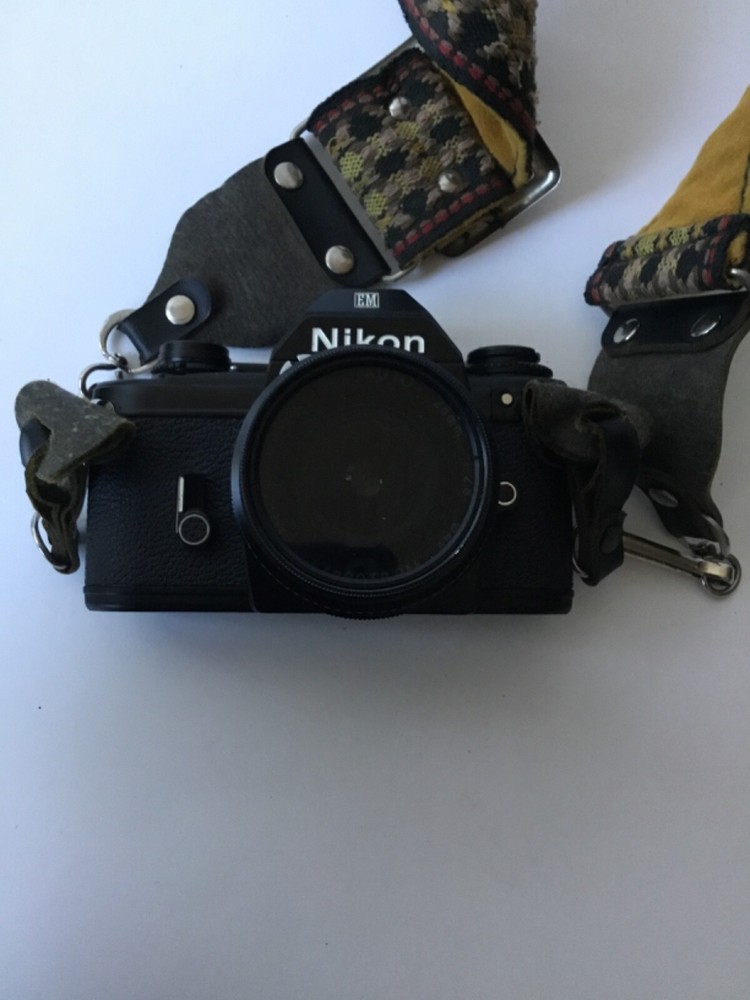 NIKON EM 35mm Nikon Camera With Case.
