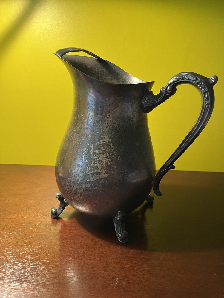 vintage silver soldered pitcher 9” tall