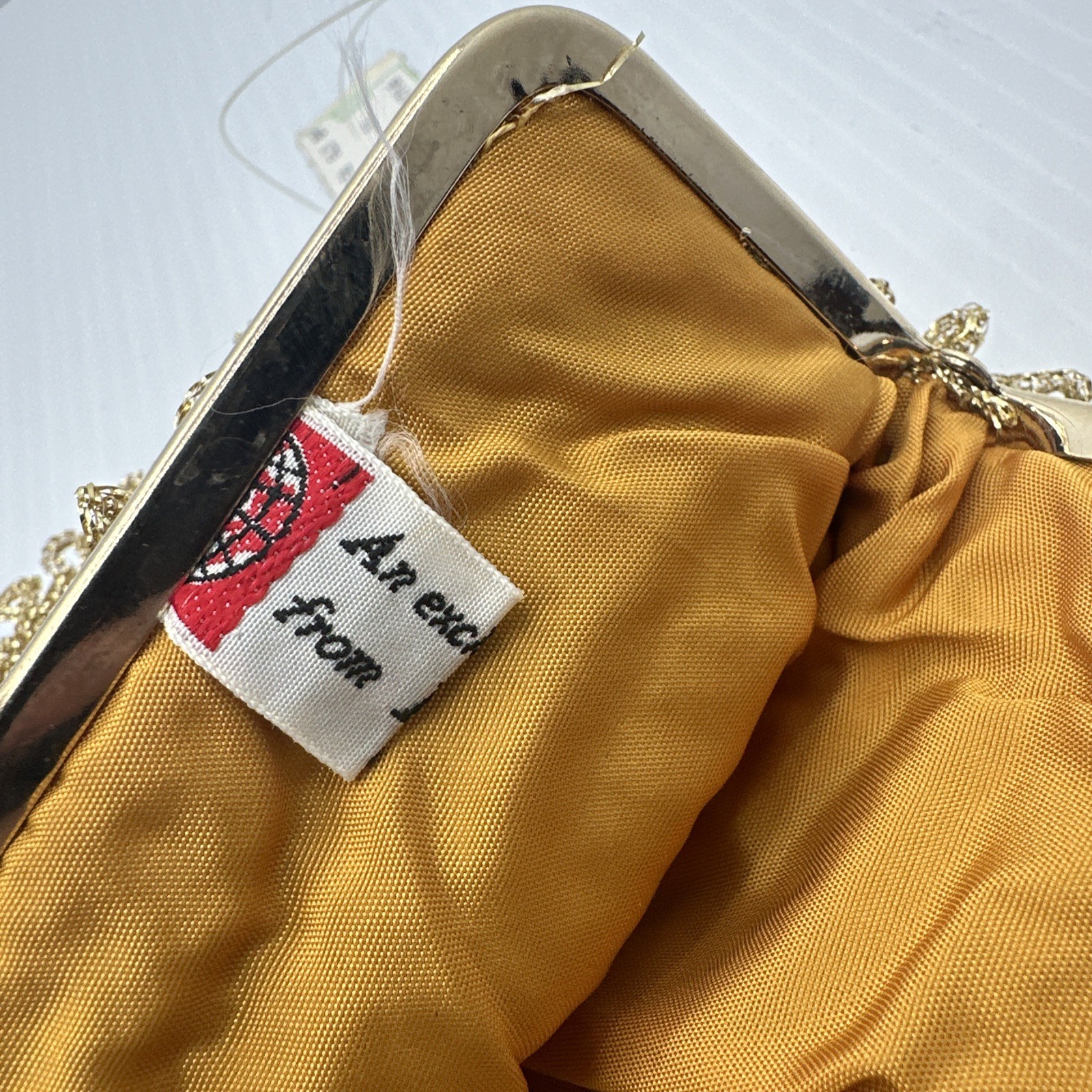 An exclusive import from Italy gold Tone purse R.N. 2906 vintage chain NWT