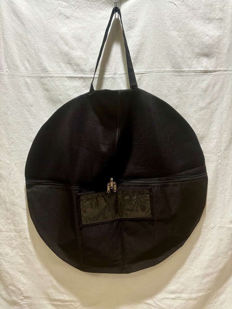 Storage for a large collapsible photography reflector (or diffuser/scrim)