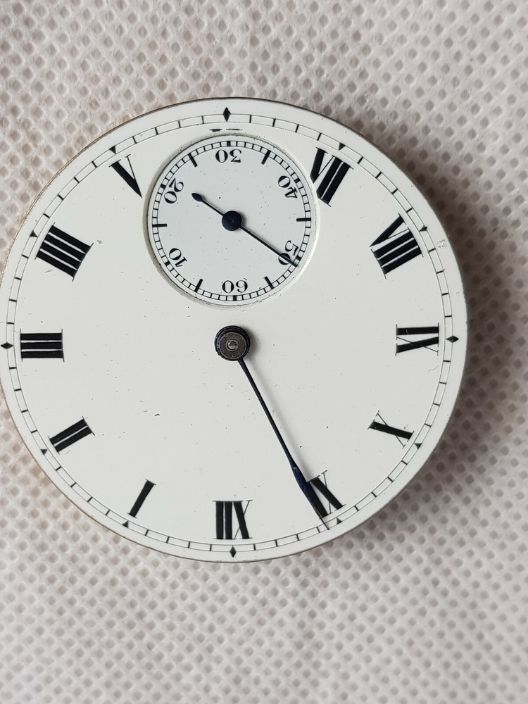 Antique Pocket Watch Movement and Face.