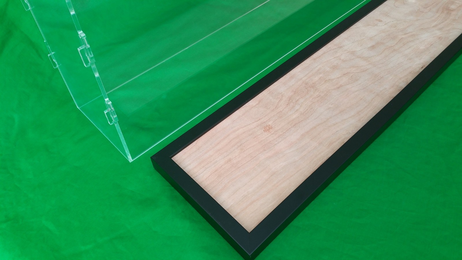 36"L x 10"W x 12"H Display case with 3/16" thick acrylic black wood frame base
