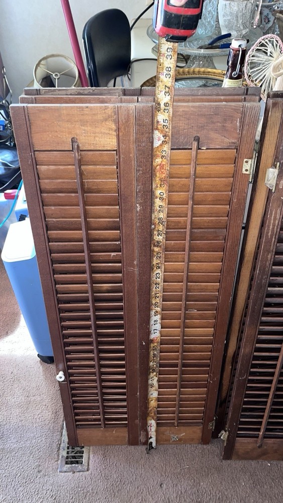 Vintage solid wood framed with hinges and knobs window shutters