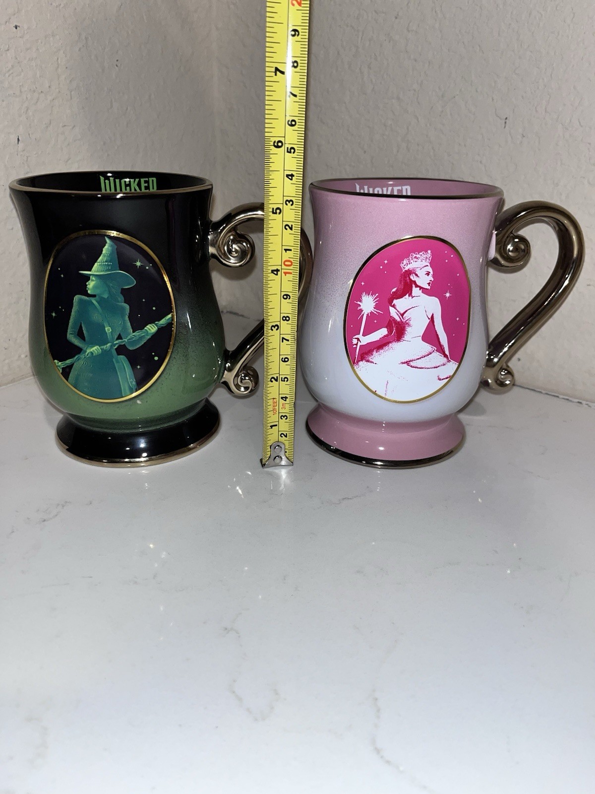 2-NWT Wicked Coffee/tea Green, Pink With Gold Handle Mug Set