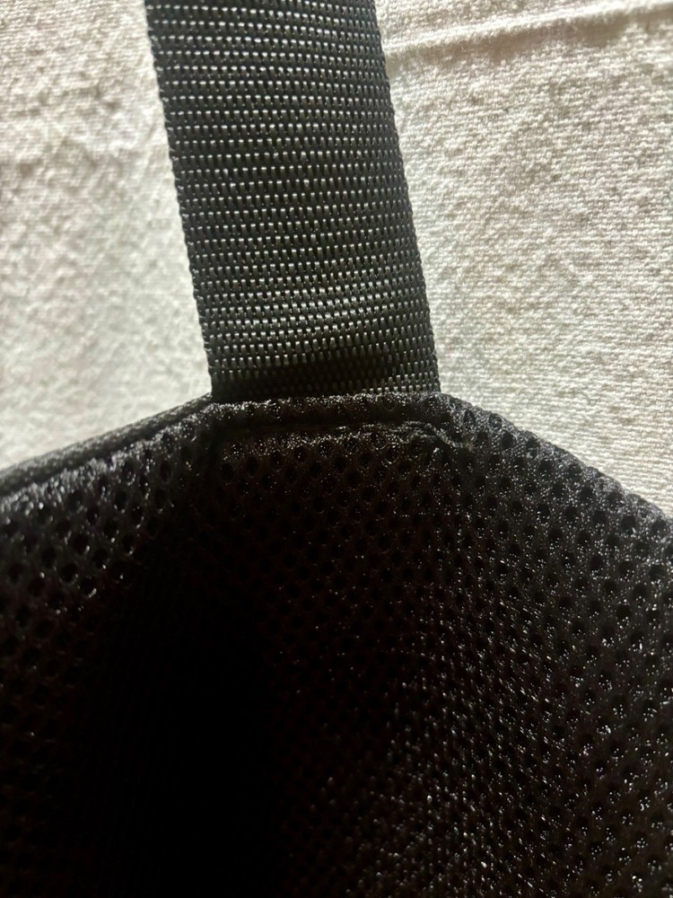 Storage for a large collapsible photography reflector (or diffuser/scrim)
