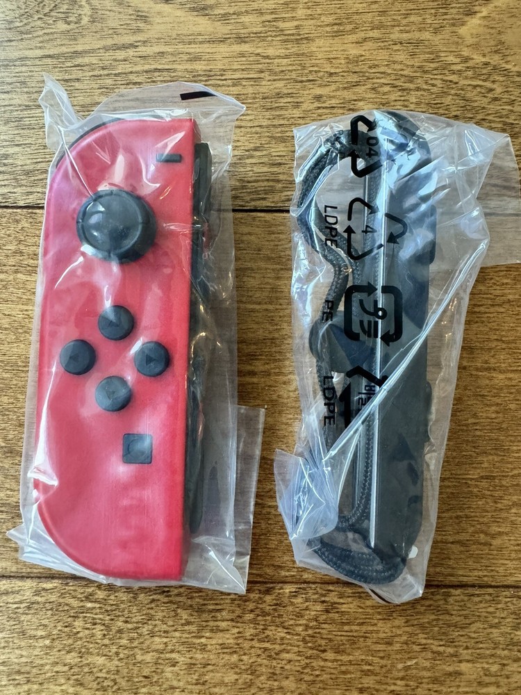 [LEFT RED JOYCON] Nintendo Switch Joy Con w/Strap Controller