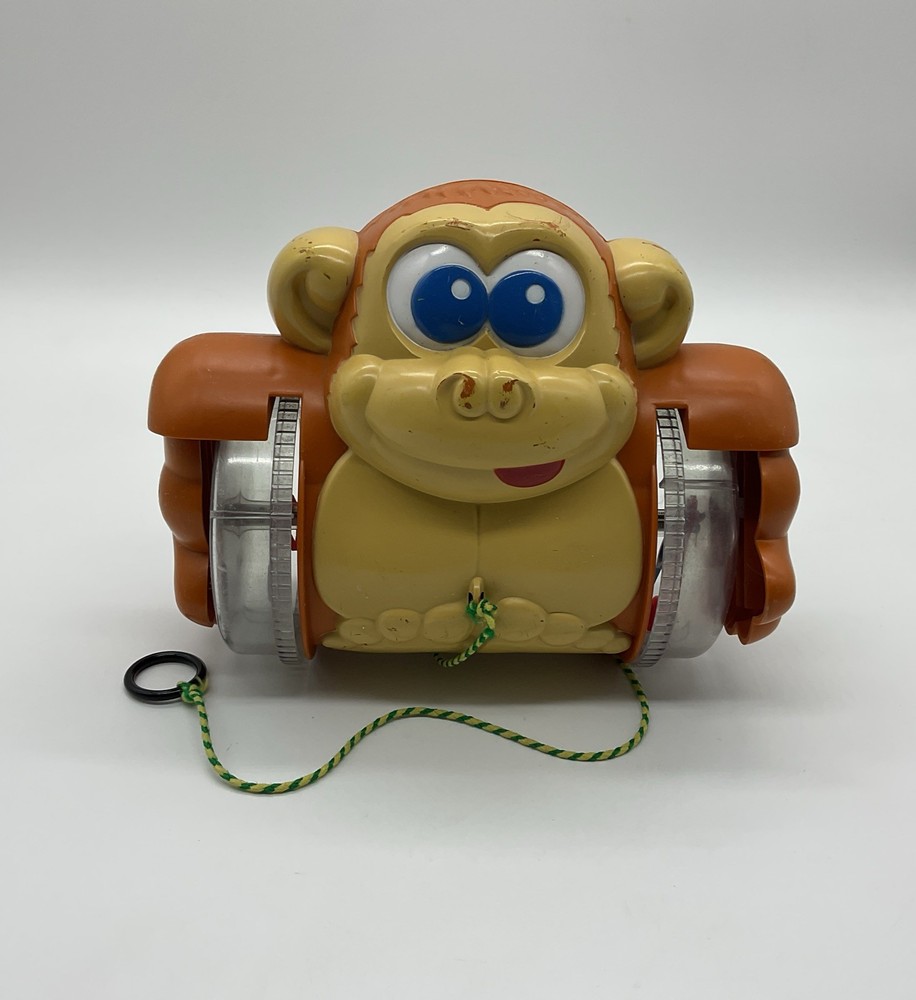 Vintage 1980s Pull Along Monkey Toy Rolling