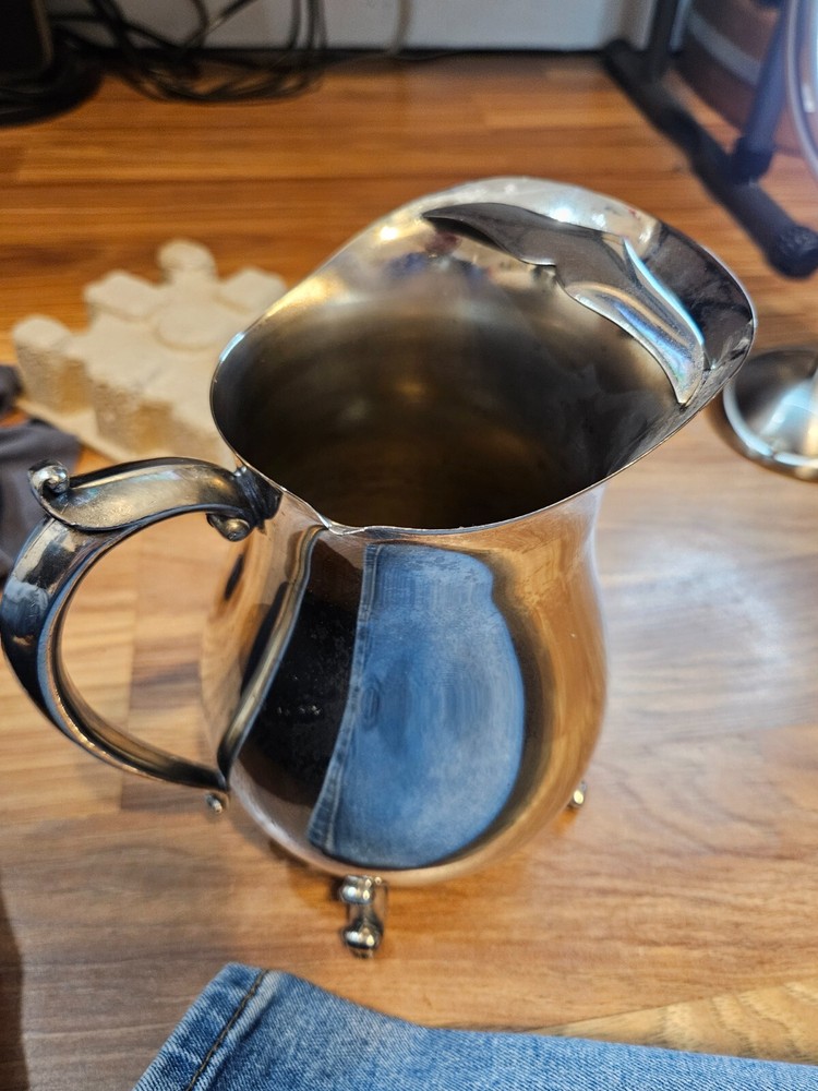 silver plated pitcher with pouring ice blocker