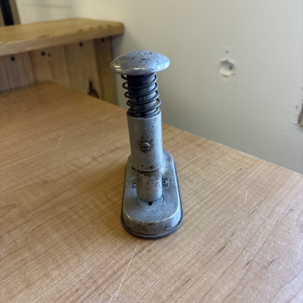 The Clipless Stand Machine - The Clipless Paper Fastener Co. - Newton, Iowa