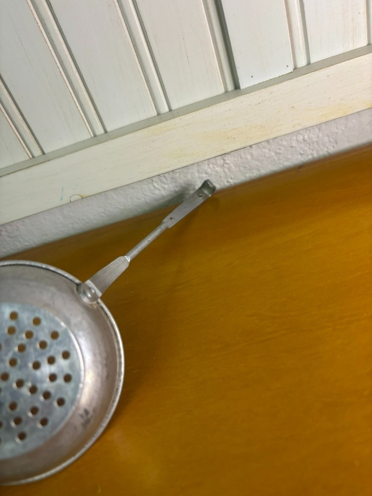 small vintage aluminum strainer
