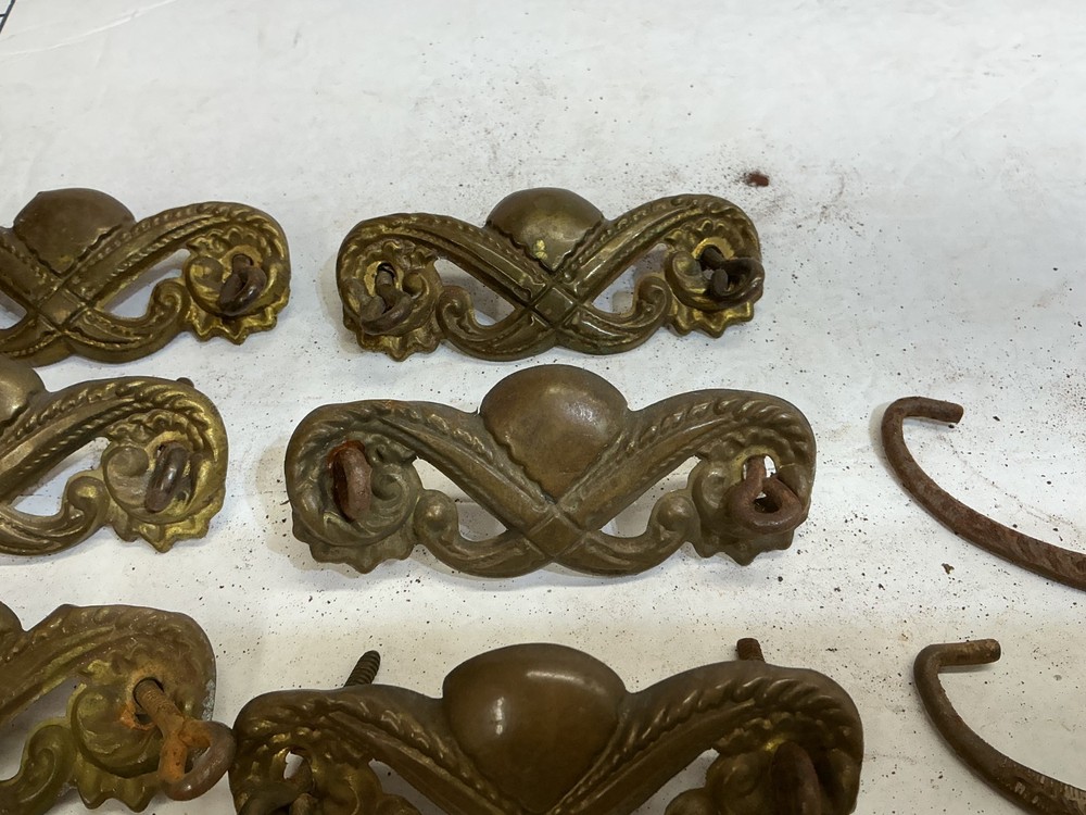 7 VINTAGE STAMPED BRASS DRAWER PULLS
